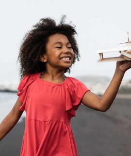 african-kid-running-on-the-beach-while-playing-with-wood-toy-airplane-focus-on-face.jpg african-kid-running-on-the-beach-while-playing-with-wood-toy-airplane-focus-on-face.jpg